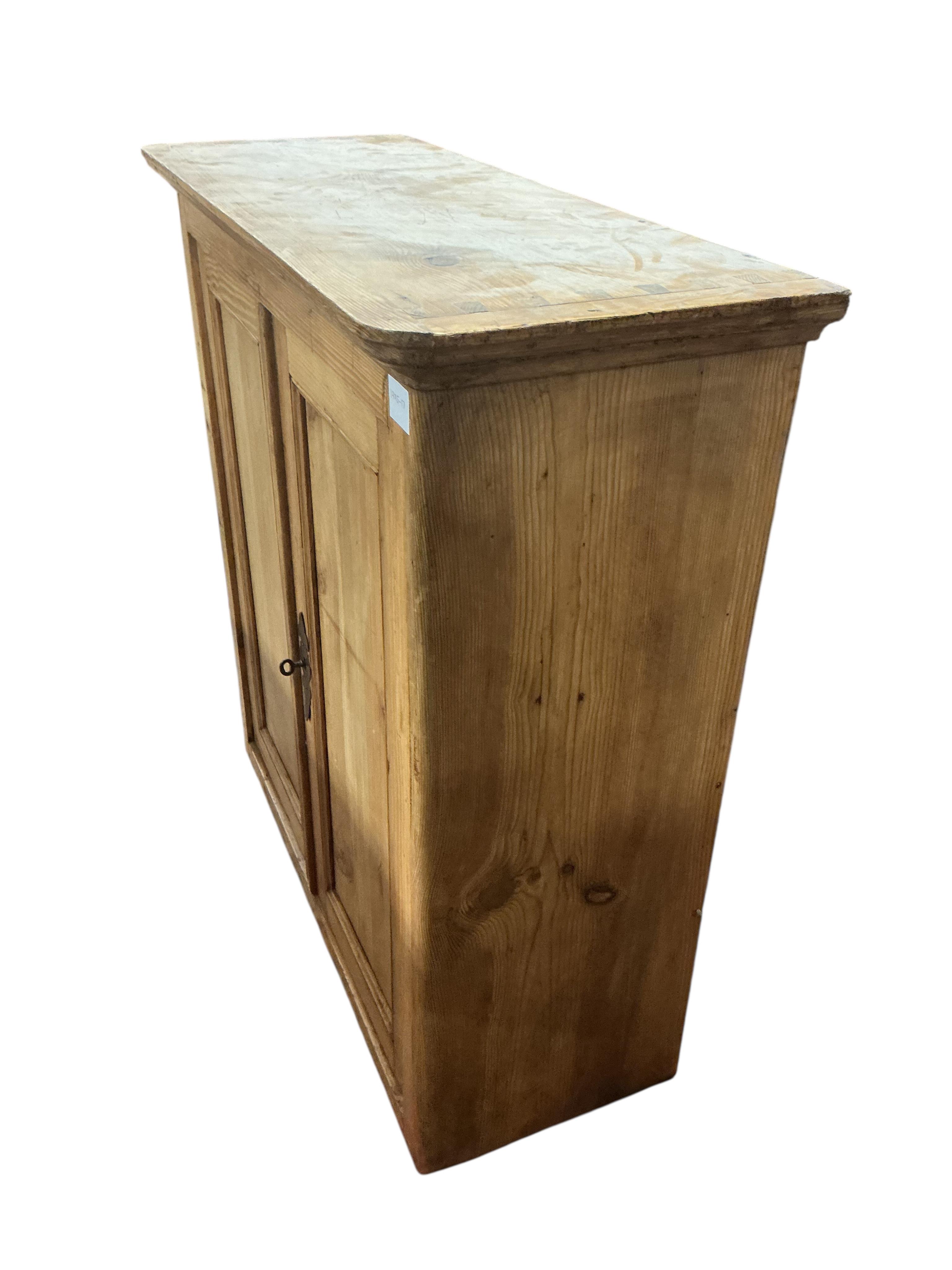 A Victorian pine two door cabinet, width 95cm, depth 37cm, height 97cm